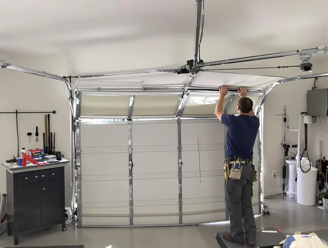 Pico Rivera Garage Door Repair specialist performing precise section replacement on Pico Rivera garage door