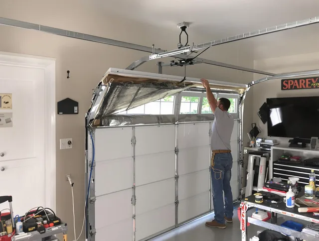 Garage door section replacement by Pico Rivera Garage Door Repair in Pico Rivera